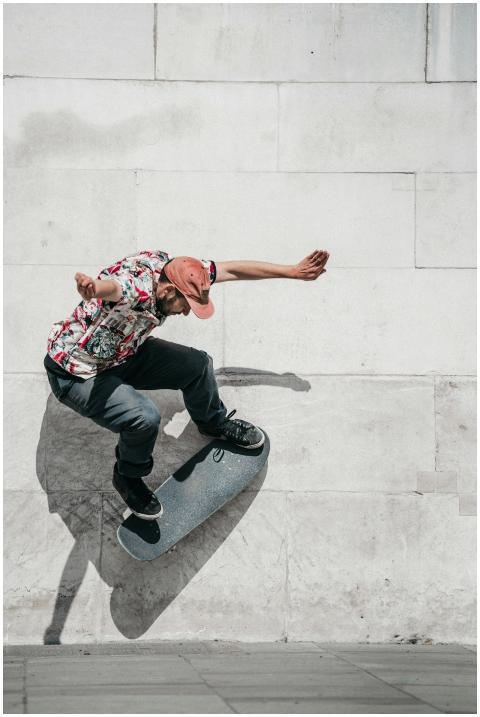 Skateboarder performs a gravity-defying stunt agai