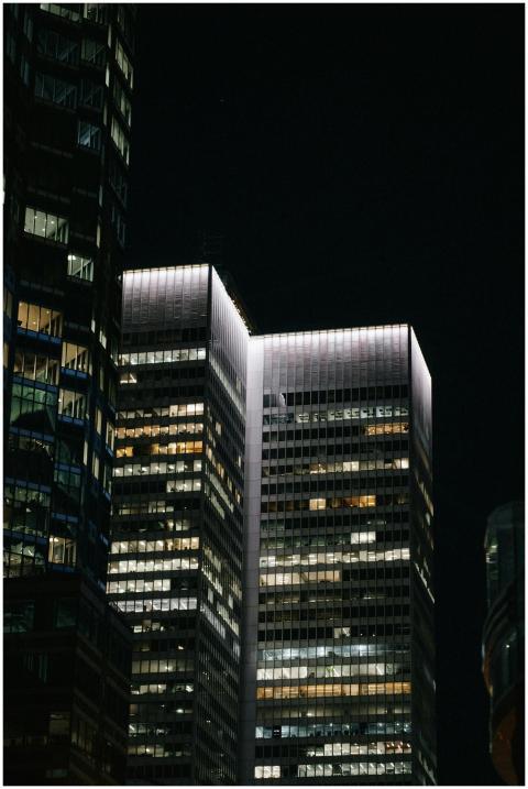 A nighttime cityscape of Montreal showcasing brigh