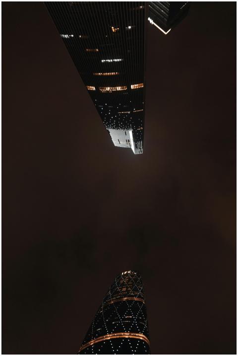Low-angle night view of illuminated skyscrapers ag