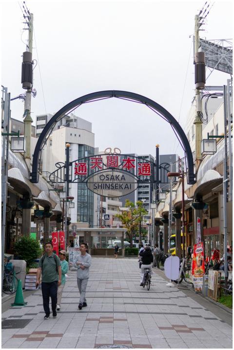 Bustling street view in Osaka's historic Shinsekai