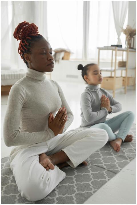 Full body of tranquil young barefooted African Ame