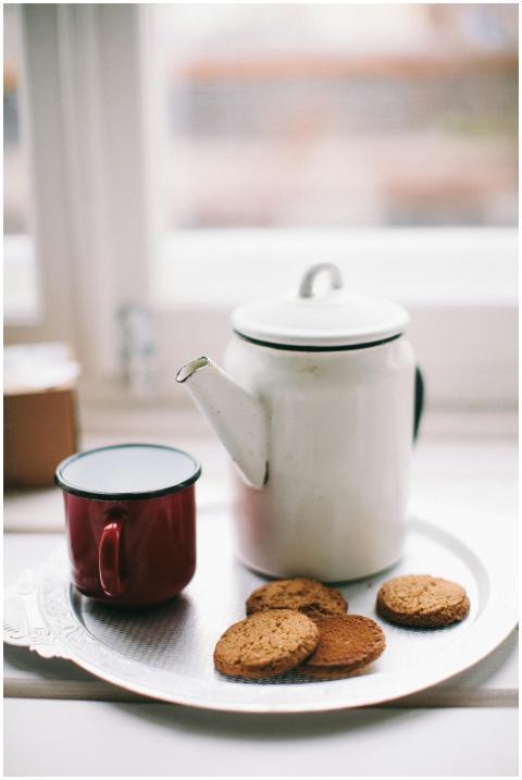 Warm morning scene with cookies and tea on a tray