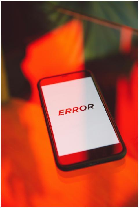 A close-up view of a smartphone showing an error m