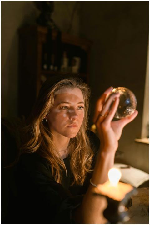 A contemplative woman explores fortune telling wit