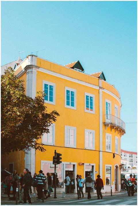 Colorful street scene in Lisbon showcasing a vibra