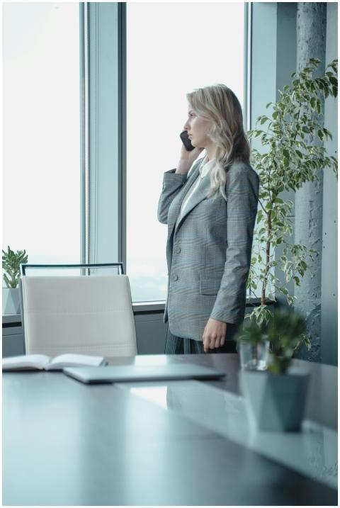 A professional businesswoman talking on the phone