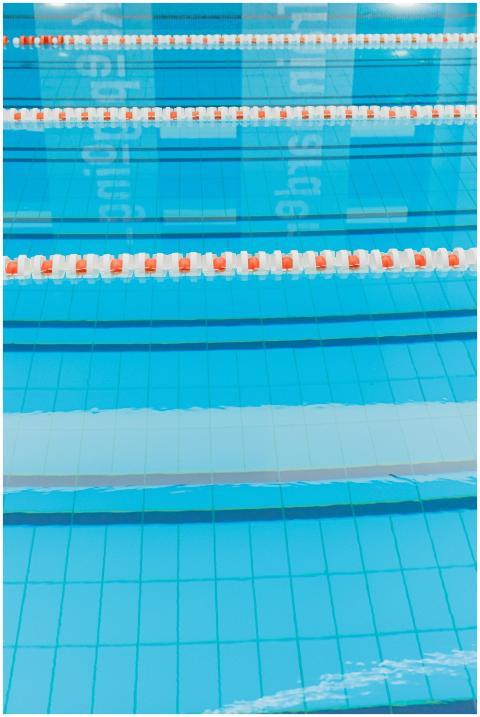 Close-up of an empty swimming pool with clear wate
