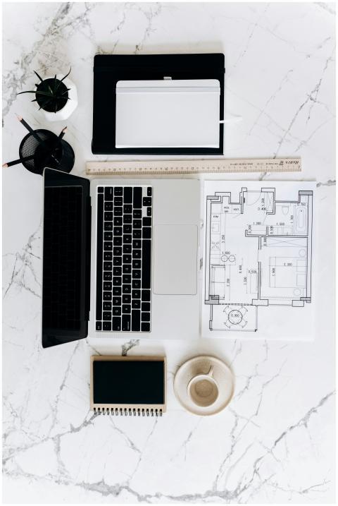 A clean, minimalist workspace setup featuring a la