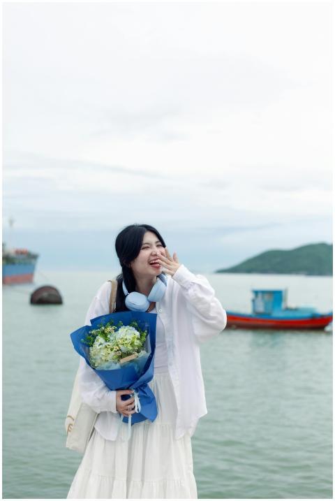 Joyful Woman Flowers Sea