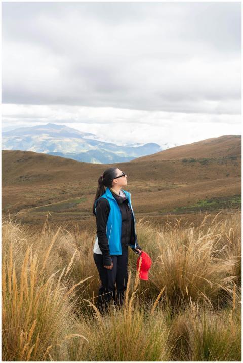 A woman gazes up at the sky amidst the beautiful A