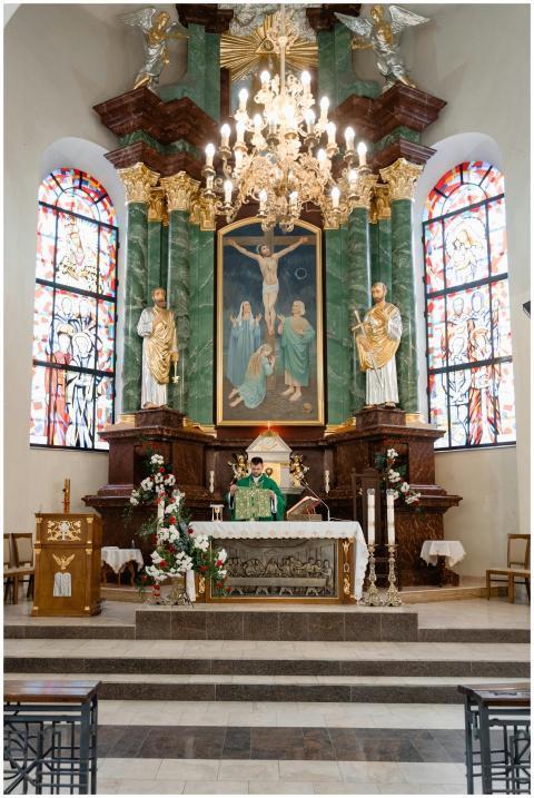 A richly decorated church interior featuring stain