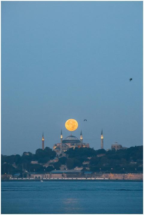 Stunning view of the full moon rising over Hagia S