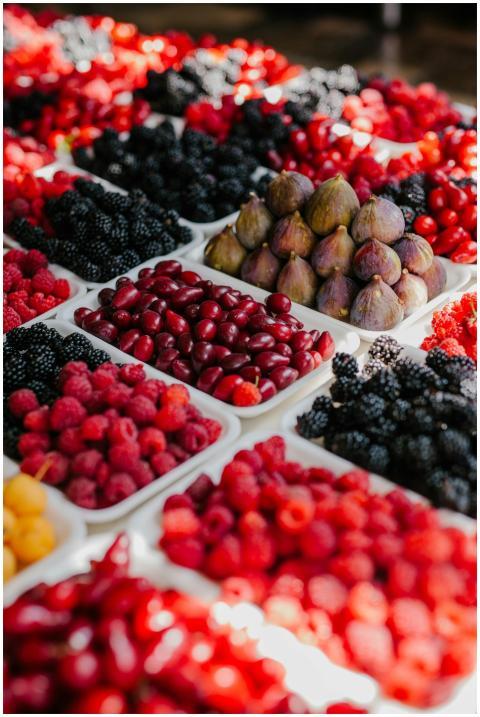 From above of assorted ripe blackberries figs rasp