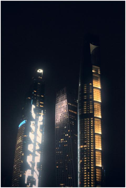 A stunning view of illuminated futuristic skyscrap