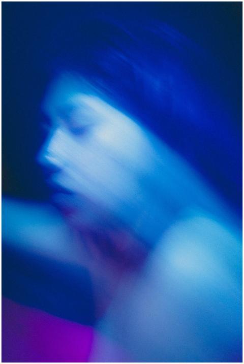 Artistic portrait using motion blur and blue light