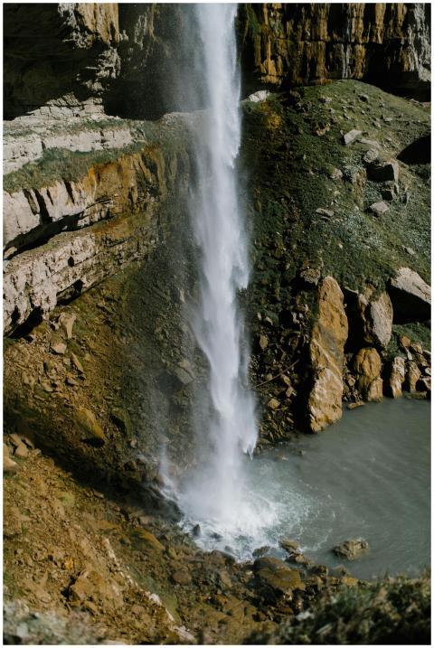 Captivating vertical waterfall cascading over rock