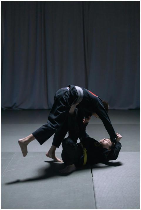 Two men engaged in intense Brazilian Jiu Jitsu spa