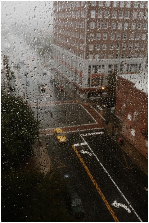 Rainy view of Greensboro NC through droplets on a
