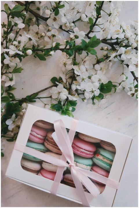 Charming box of assorted macarons wrapped in ribbo