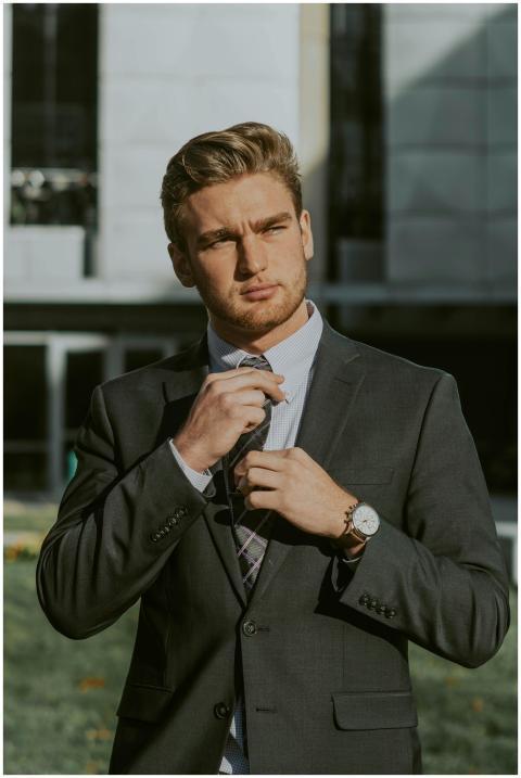Serious confident male entrepreneur wearing classy