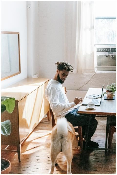 Side view of serious young ethnic man in casual cl