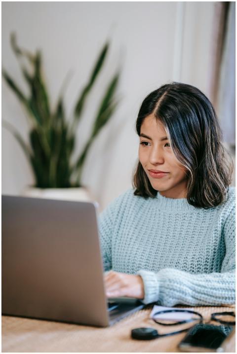Confident young Hispanic woman in casual clothes w