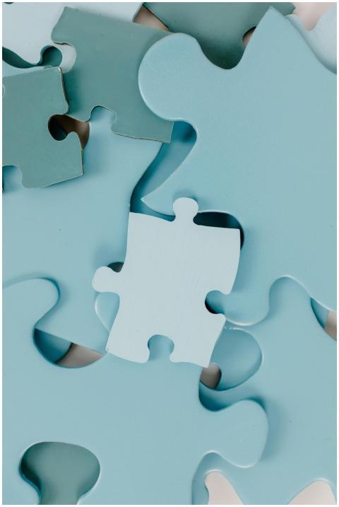 High-quality close-up image of blue puzzle pieces,