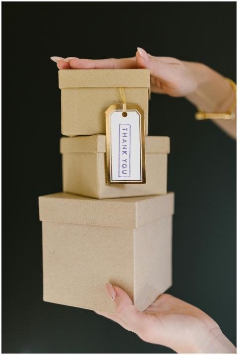 Three kraft gift boxes stacked with a 'Thank You'