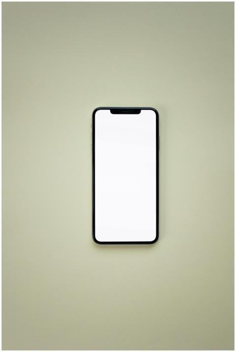 Smartphone with blank screen on neutral background