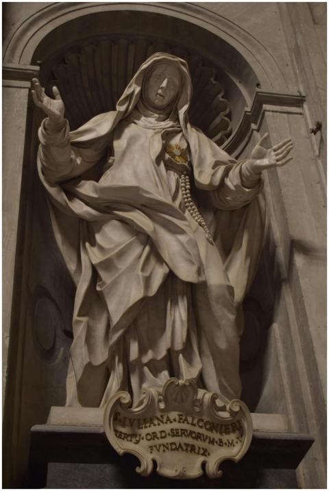 Beautiful marble statue of a saint inside a histor