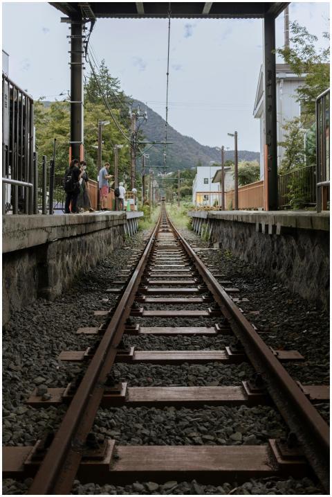 Railway tracks at Hakone train station with a pict