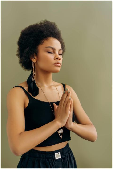 Serene African American woman practicing meditatio