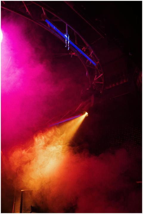 Colorful nightclub scene with vibrant lighting and