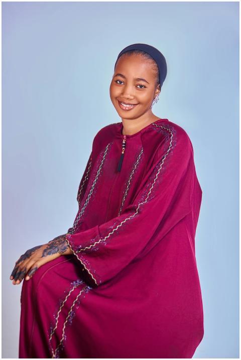 Smiling Woman Maroon Traditional