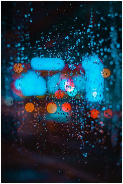 Colorful city lights creating bokeh effect through