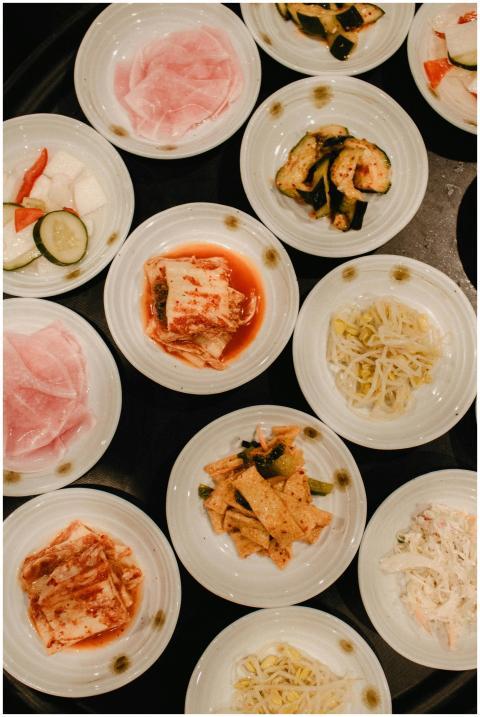 An overhead view of various Korean side dishes ser
