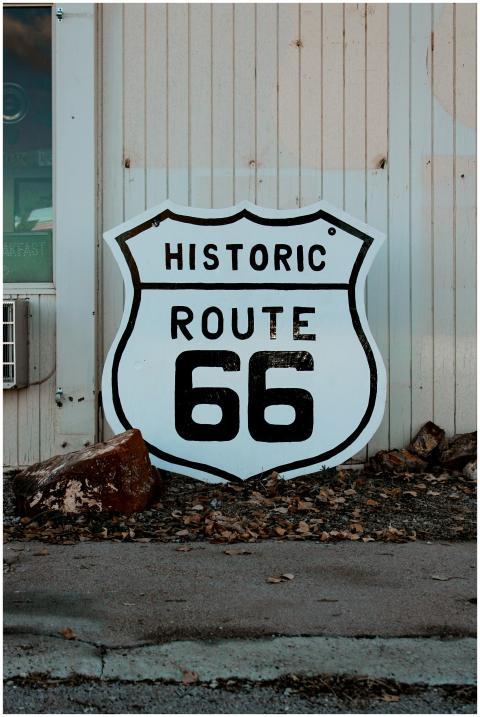 Vintage Route 66 sign on roadside in Seligman, Ari