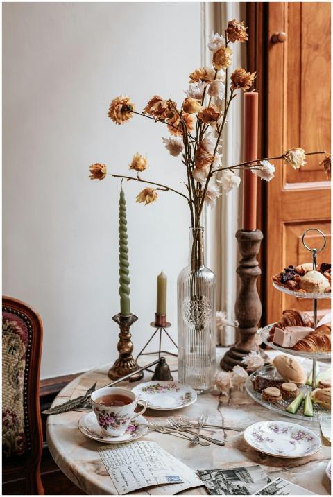 A beautifully arranged vintage high tea setup with