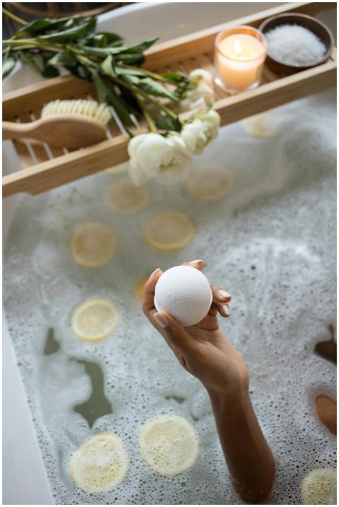 From above of unrecognizable female sitting in bat