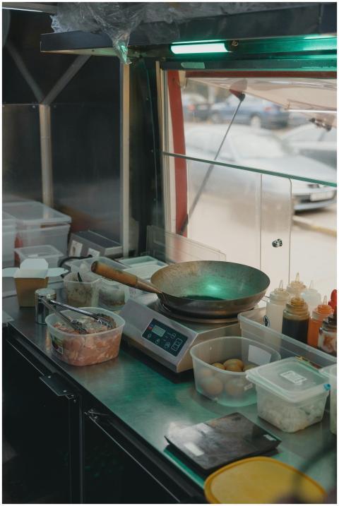 A glimpse into a food truck kitchen with various c