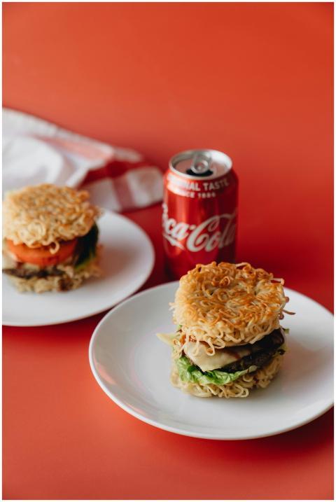 Creative ramen burger paired with Coca-Cola agains