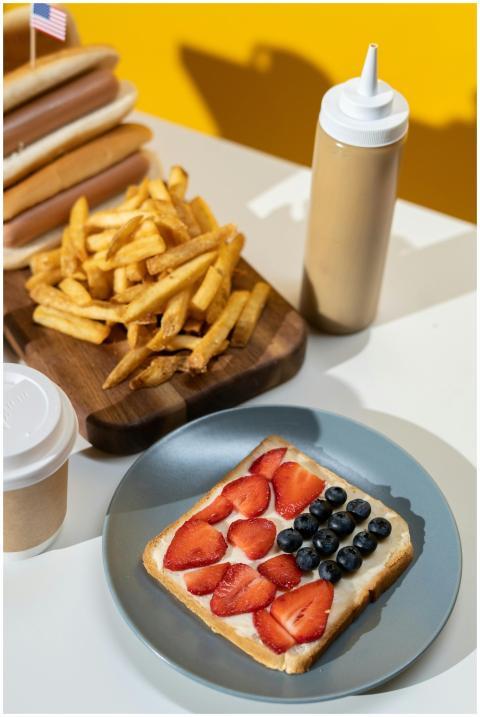 French fries and patriotic berry toast arranged on