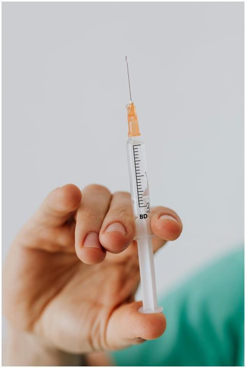 Detailed close-up shot of a hand holding a medical