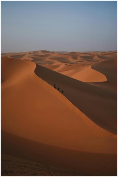 Stunning view of sand dunes under a clear blue sky
