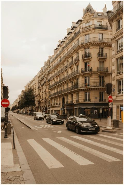 Paris street scene showcasing iconic Haussmann arc