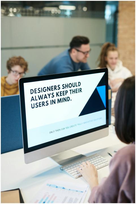 Group of designers collaborating in modern office