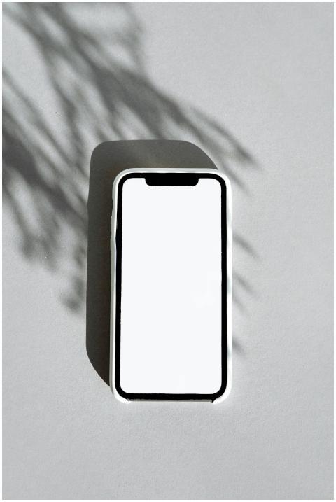 Blank smartphone screen on gray background with ar