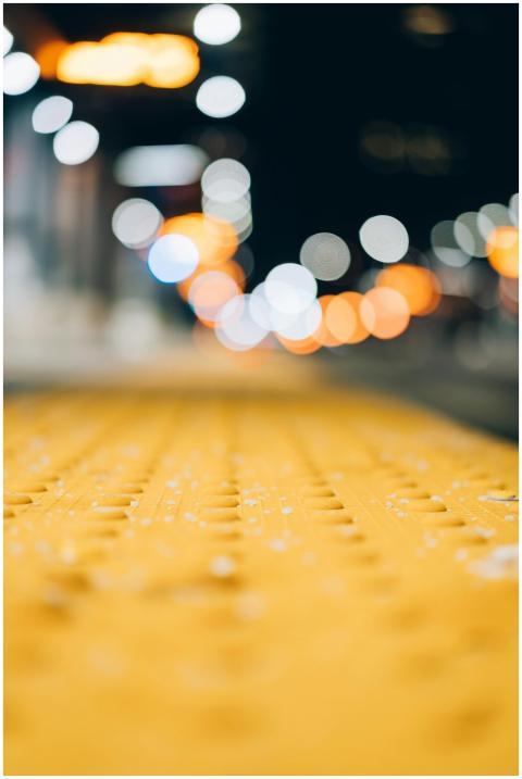 Blurred city lights with bokeh effect on a texture