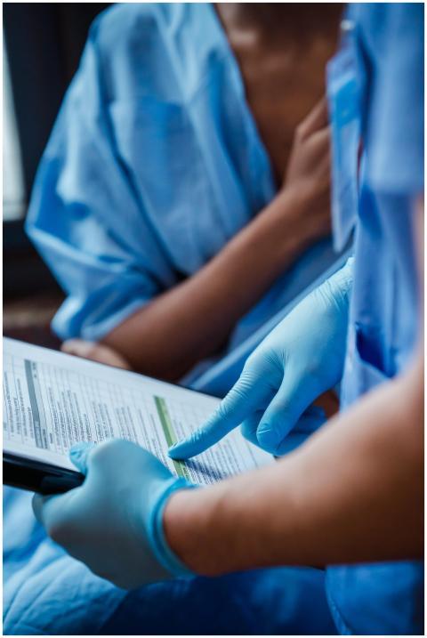 Crop unrecognizable doctor in uniform and sterile