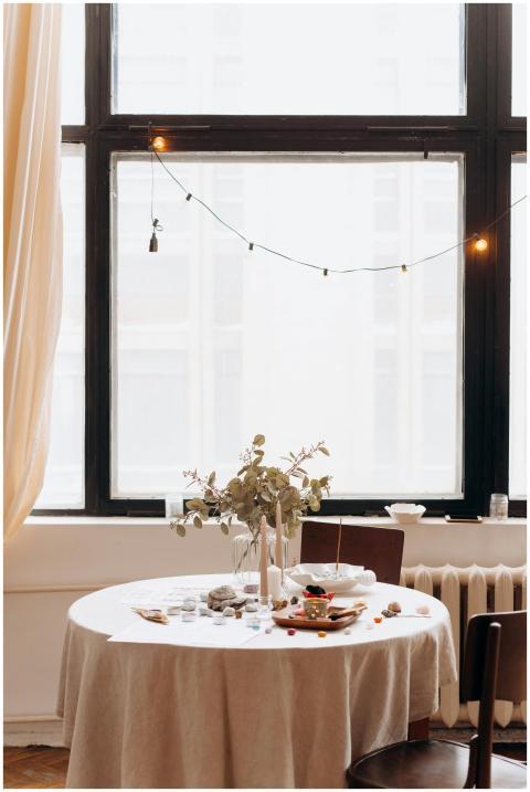 Bright dining room with a round table, decorative